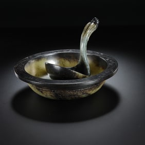 A SET OF CHINESE HAN DYNASTY JADE BOWLS AND SPOONS