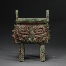 CHINESE SHANG AND ZHOU DYNASTY SQUARE DING WITH ANIMAL FACE PATTERN
