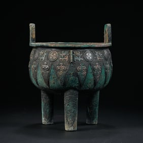 CHINESE SHANG AND ZHOU DYNASTY TRIPOD FURNACE WITH TWO HANDLES