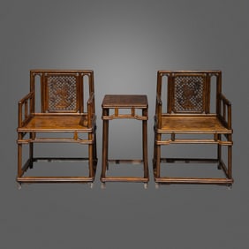 A PAIR OF CHINESE QING DYNASTY HUANGHUALI WOOD ARMCHAIRS