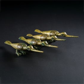 A GROUP OF CHINESE LIAO DYNASTY GILT BRONZE GARUDA BIRDS