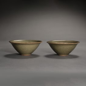 A PAIR OF YAOZHOU KILN GREEN-GLAZED HAT CUPS FROM THE NORTHERN SONG DYNASTY
