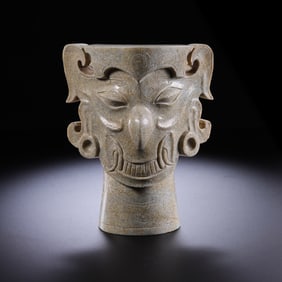 ANCIENT CHINESE JADE ARTIFACTS WITH ANIMAL FACE PATTERNS