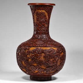 QING DYNASTY, QIANLONG PERIOD, A RED CARVED DRAGON-PATTERNED CELESTIAL GLOBE VASE