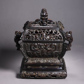 QING DYNASTY. A ROSEWOOD INCENSE BURNER WITH TWO HANDLES AND A LID.