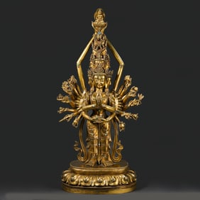 QING DYNASTY A GILT-BRONZE FIGURE OF A STANDING BUDDHA INLAID WITH GEMS