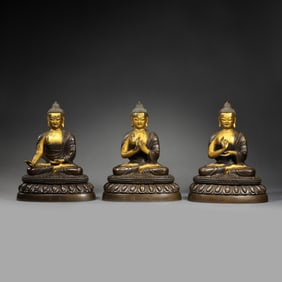 A GROUP OF PARTIALLY GILDED BRONZE FIGURES OF SIX-RANK SEATED BUDDHAS, QIANLONG PERIOD, QING DYNASTY