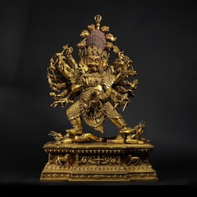 MING DYNASTY. GILT-BRONZE FIGURE OF A STANDING BUDDHA