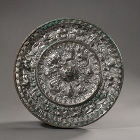 7-10CENTURY, BRONZE MIRROR WITH SEA BEASTS AND GRAPES