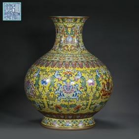 QING DYNASTY, QIANLONG PERIOD, YELLOW GLAZE AND FAMILLE ROSE FLOWER PATTERN VASE