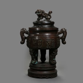 QING DYNASTY, A BRONZE CENSER WITH TWO HANDLES AND THREE LEGS AND AUSPICIOUS BEAST BUTTONS
