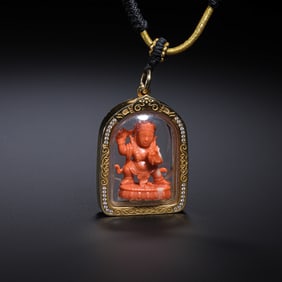 QING DYNASTY. A CORAL BUDDHA NECKLACE