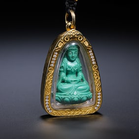 QING DYNASTY. A TURQUOISE BUDDHA NECKLACE