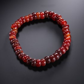10-12CENTURY, LIAO DYNASTY RED AGATE GRINDING WHEEL BEAD BRACELET
