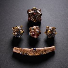 A SET OF DRAGONFLY EYE GLASS BEADS FROM THE WARRING STATES PERIOD, BEFORE THE MING DYNASTY