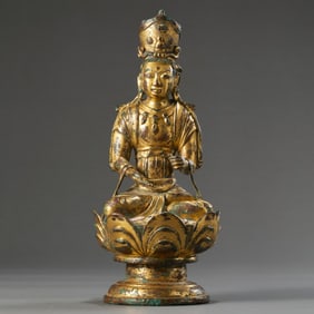 10-12A GILT-BRONZE STATUE OF A SEATED BUDDHA FROM THE LIAO DYNASTY