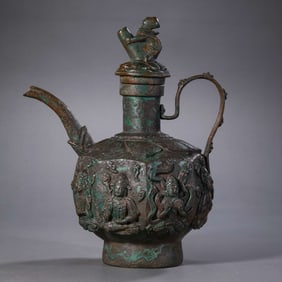 10-12A BRONZE EWER WITH RELIEF FROM THE LIAO DYNASTY, 16TH CENTURY