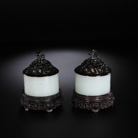 A pair of Chinese Qing Dynasty Hetian white jade incense burners