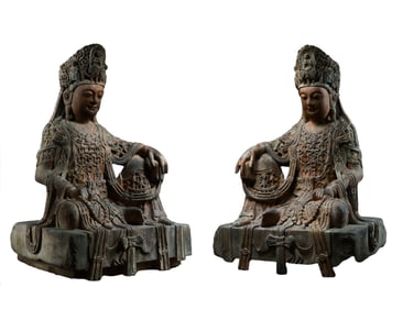 A pair of painted bluestone statues of seated Avalokitesvara from the Northern Wei Dynasty, China