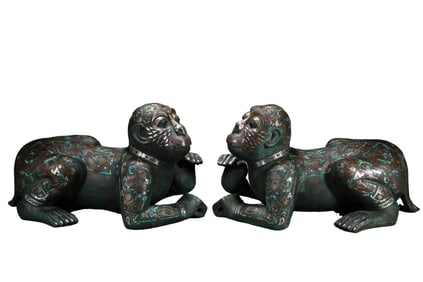A pair of gold and silver inlaid human-faced beasts from the Warring States Period of China