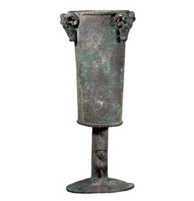 Ancient Roman bronze cup with three goat heads