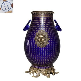 A Chinese Qing Dynasty Kangxi period blue glaze gilded vase