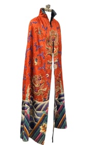 Chinese Qing Dynasty red satin cloak with gold embroidered sea dragon pattern