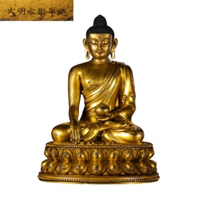 A Chinese gilt bronze statue of a seated Buddha from the Yongle period of the Ming Dynasty