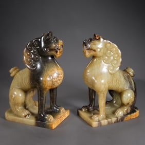 A pair of Chinese Han Dynasty jade lion statues