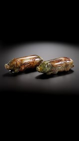 A pair of Chinese Han Dynasty jade pig hands