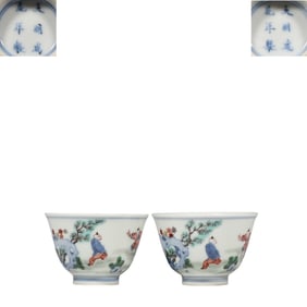 A pair of Chinese Ming Dynasty Chenghua period Doucai cups with story designs