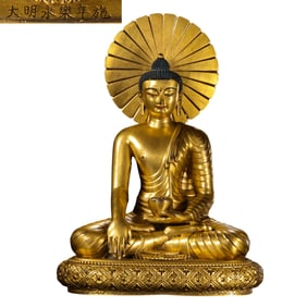A Chinese gilt bronze statue of a seated Buddha from the Yongle period of the Ming Dynasty
