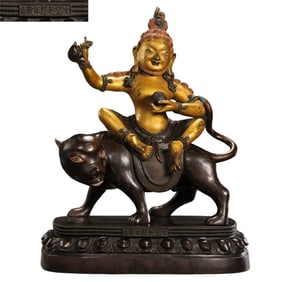 Partially gilded bronze statue of a warrior riding a tiger, Qianlong period of the Qing Dynasty,