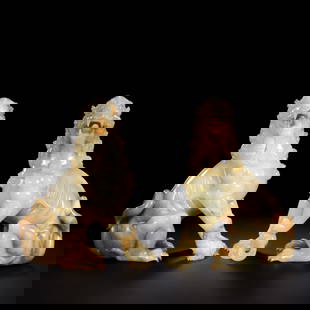 A pair of Chinese Han Dynasty jade lion statues: H. 21 cm. W. 8 cm. Weight. 3738 gram.