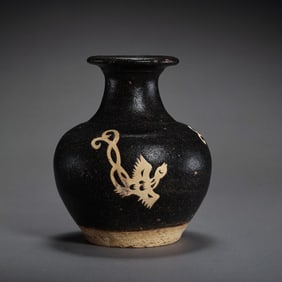 Chinese Southern Song Dynasty Jizhou kiln black glaze paper-cut pattern bottle
