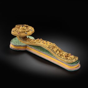 A Chinese Qianlong period silver-gilt and gem-inlaid Ruyi ornament