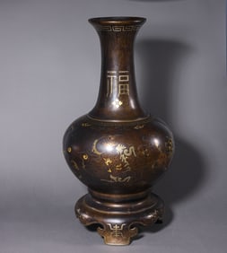 A pair of Chinese Qing Dynasty bronze gilt vases