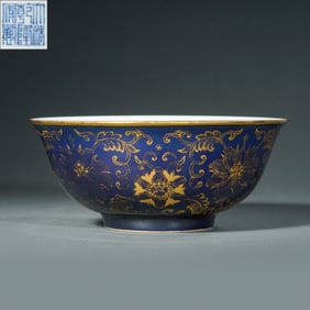 A Chinese Qing Dynasty Qianlong period blue-glazed and gilded bowl