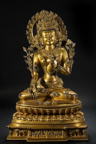 A Chinese Ming Dynasty gilt-bronze statue of Tara