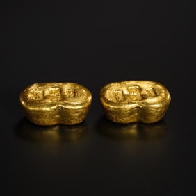 A pair of pure gold ingots from the Qing Dynasty
