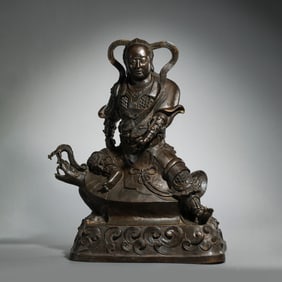 Chinese Ming Dynasty bronze figure sitting