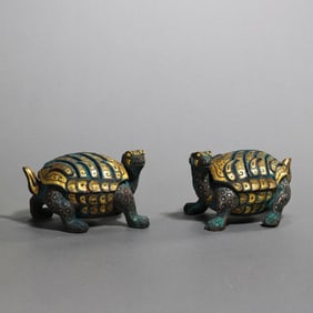 A pair of Chinese Warring States Period inlaid gold and silver auspicious beast incense burners