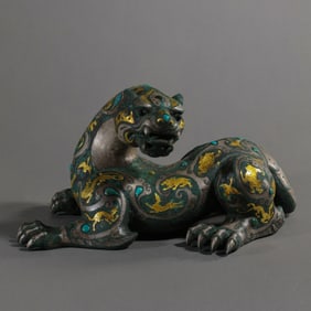 Auspicious beasts inlaid with gold, silver and turquoise from the Warring States Period of China