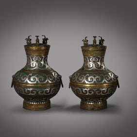 A pair of Chinese Warring States Period inlaid gold and silver covered pots