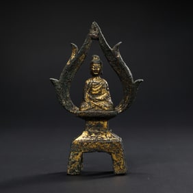 A Chinese Northern Wei Dynasty gilt-bronze seated Buddha statue
