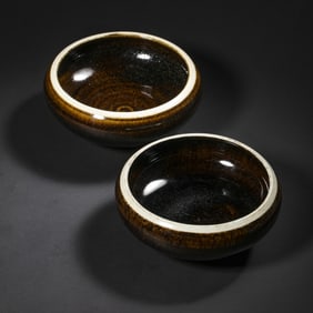 A pair of black-glazed bowls from the Gongxian kiln of the Tang Dynasty, China