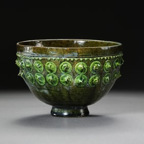 Chinese Sui Dynasty green-glazed bowl with drum-nail pattern