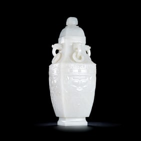 Chinese Qing Dynasty Hetian white jade animal face pattern square cover vase with ring ears