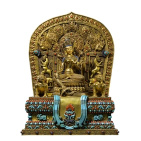 A Chinese Ming Dynasty gilt-bronze seated Buddha statue inlaid with gemstones