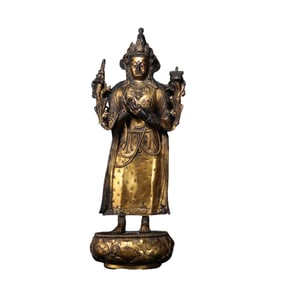 A Chinese Qing Dynasty gilt-bronze standing Mongolian Buddha statue